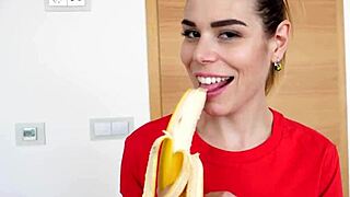 cute teen fingers pussy while eating banana