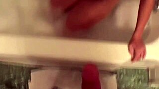 Misty undresses and bathes in the bathtub with natural brunette features