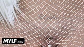 Milf in thigh high fishnet stockings enjoys a casual encounter