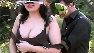 Intense public fucking with strangers in the garden. Brunette milf embraces the outdoor thrill.