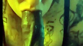 A plump BBW eagerly sucks a massive black cock in the bedroom.