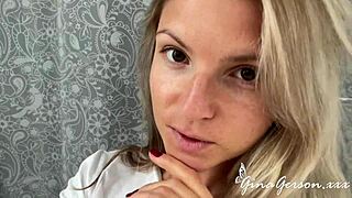 Blonde solo girl with red nails teasing her panties