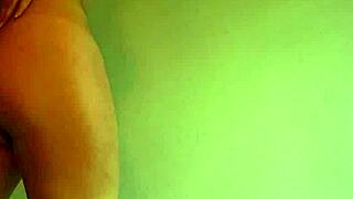 Big tits milf undresses in red dress on webcam