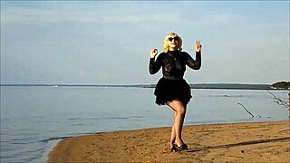 Hot milf flashes her pussy on the beach.