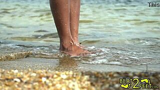 Brunette teen's wet feet teased at beach on Beat2FeetCom solo