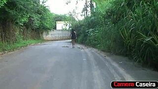 Young brunette boldly shows off her delicious ass on the street.