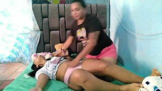 Two latinas get steamy while one brushes the other's hair