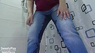 A woman in desperate need wets her jeans