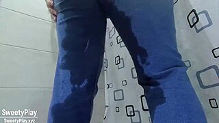 A woman in desperate need wets her jeans