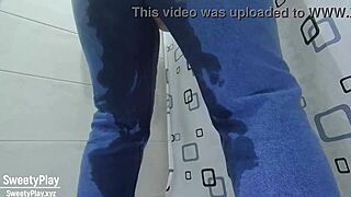 A woman in desperate need wets her jeans
