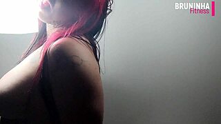 Brazilian cowgirl displays silicone breasts