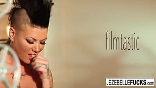 Jezebelle Bond, the sultry brunette milf pornstar, indulges in solo pleasure. She works her wet pussy with intense masturbation.