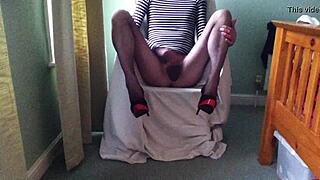 penny the tranny in fishnets and heels masturbates with a cock