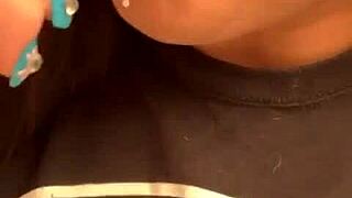 Marcy Diamond is enjoying a lollipop with lots of spit in a fun, messy way