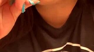 Marcy Diamond is enjoying a lollipop with lots of spit in a fun, messy way