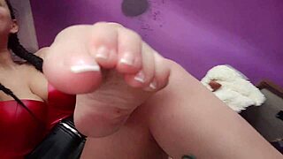 In action — natural breasts and feet fetish