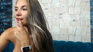 Busty blonde girl plays with toys on webcam, dildo in pussy.