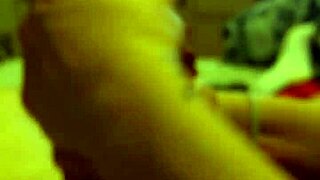 The sexy redhead gives a handjob to her best friend's big cock, ending in a facial.