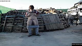 A horny couple enjoys outdoor fucking on a log