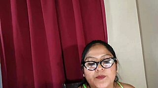 latin rain in green outfit on webcam