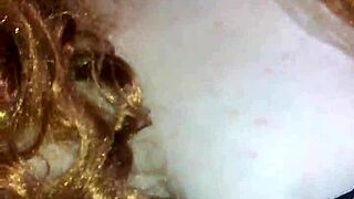 Bound Woman Uses Black Dildo