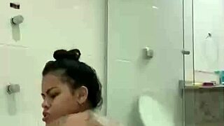 bia enjoys a solo session with the shower jet