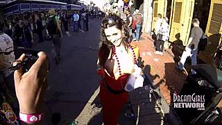 Bourbon Street afternoon flashing with wild public antics.