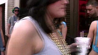 Bourbon Street afternoon flashing with wild public antics.