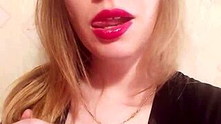 The wife, feeling horny, fingers her pussy and films it for her husband to watch.