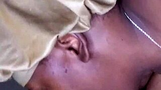 ebony bonnet works hard outdoors, showing small tits and tattoo