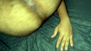 Two chubby black guys engage in hot gay sex on the bed