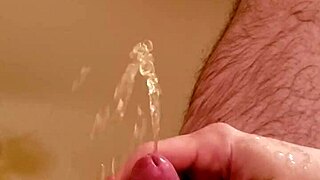 golden shower on shaved small cock