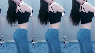 sexy chinese girl dances with vibrator making her pussy horny