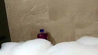 cyno enjoys solo bubble bath fun in costume play