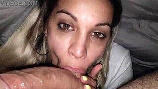 I love this petite brunette's deepthroat blowjob under the sheets!