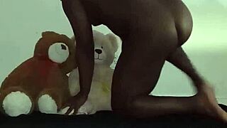Enjoying a threesome with furry toy bears? Brown and caucasian ones playing.