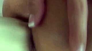 the bigtits milf mistress dominates her sub with strapon and fingering, leading to a cumshot.