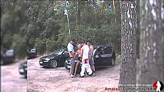 Swinger couple enjoys foursome with two guys in public parking lot car sex.