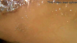 Cathy b relaxes in the jacuzzi with her partner.