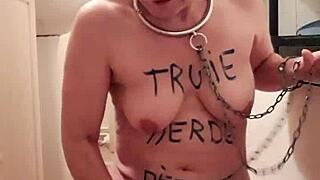 the female slave conducts a self-submission session, embracing her whore slut side in bdsm mode