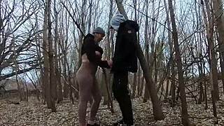 A topless thick girl gives a blowjob in the public park