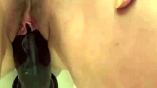 White Mature Uses Big Black Toy