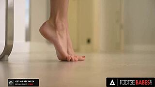 pretty brunette sybil in stockings teases with feet