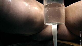 Lexi Is Strapped To The Bondange Bench And Has Her Six Pack Inflated Out Of Existence With An Enema