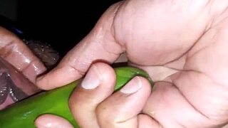 this sexy indian wife is using a cucumber on her pussy 😍