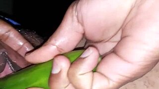this sexy indian wife is using a cucumber on her pussy 😍