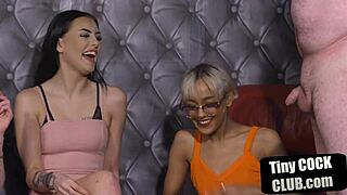 Small cock dude gets wanked by femdom babes in heels and dresses