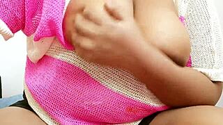 Amateur babe with big tits in a casual setting.