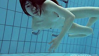 Roxalana Cheh Explores Underwater as a Czech Redhead