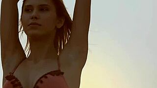 four lesbian girlfriends relax on the beach with striptease fun